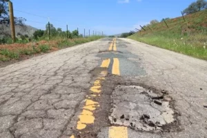 car wrecks because of potholes
