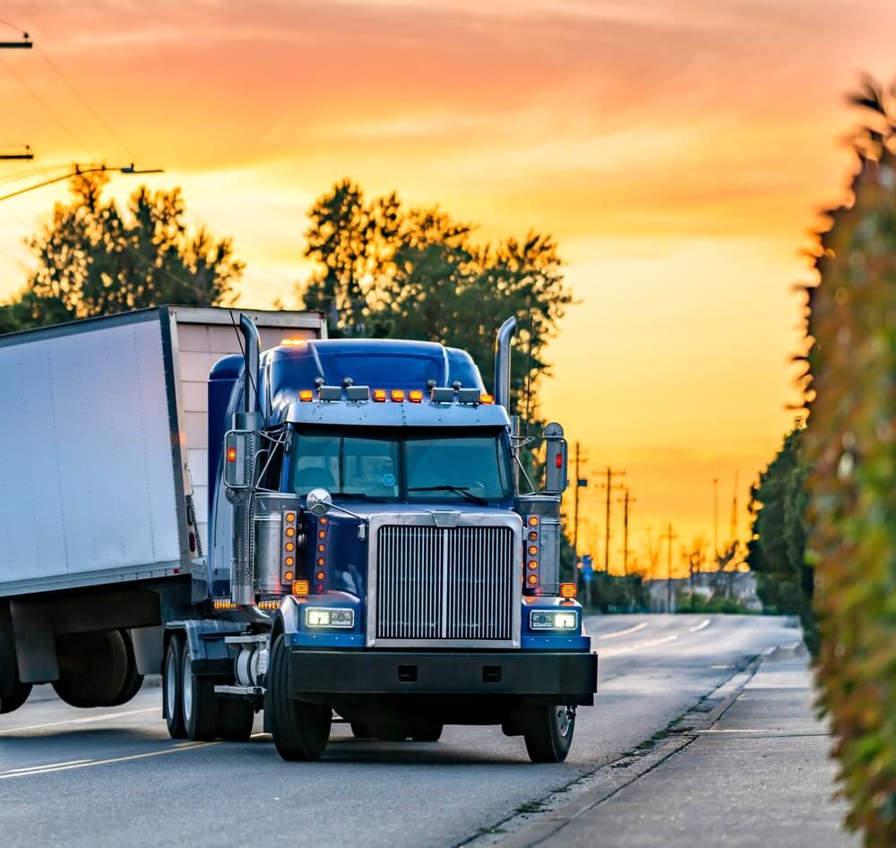 Semi-truck driving on I-35 near San Marcos where serious truck accidents often occur